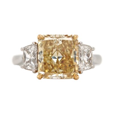 Three-Stone Collection - Radiant-cut Fancy Deep Yellow Diamond with Trapezoid Side Stones in Platinum
