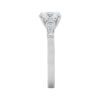 Three-Stone Collection - Round Brilliant cut Diamond with Baguette Side Stones in Platinum - Image 4