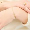 0.90 Carat Round Brilliant Cut Diamond Bangle Bracelet in Yellow Gold - Image 3