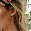 Poppy Rae Pebble U Hoop Earrings in Yellow Gold - Image 5