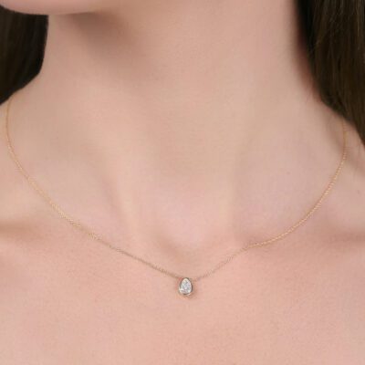 0.52 carat Pear shape Bezel set Diamond Pendant Necklace in Yellow Gold