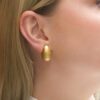 Brushed Button Clip Earrings in Yellow Gold - Image 4